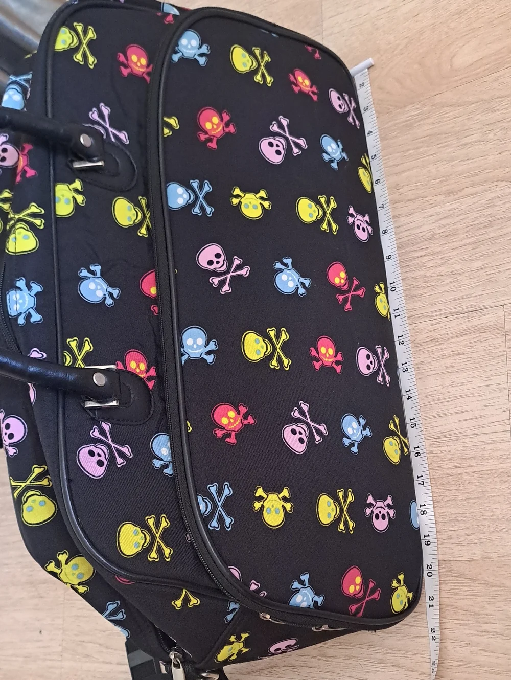 Skulls Design Black Duffel Bag with Multicolor Print